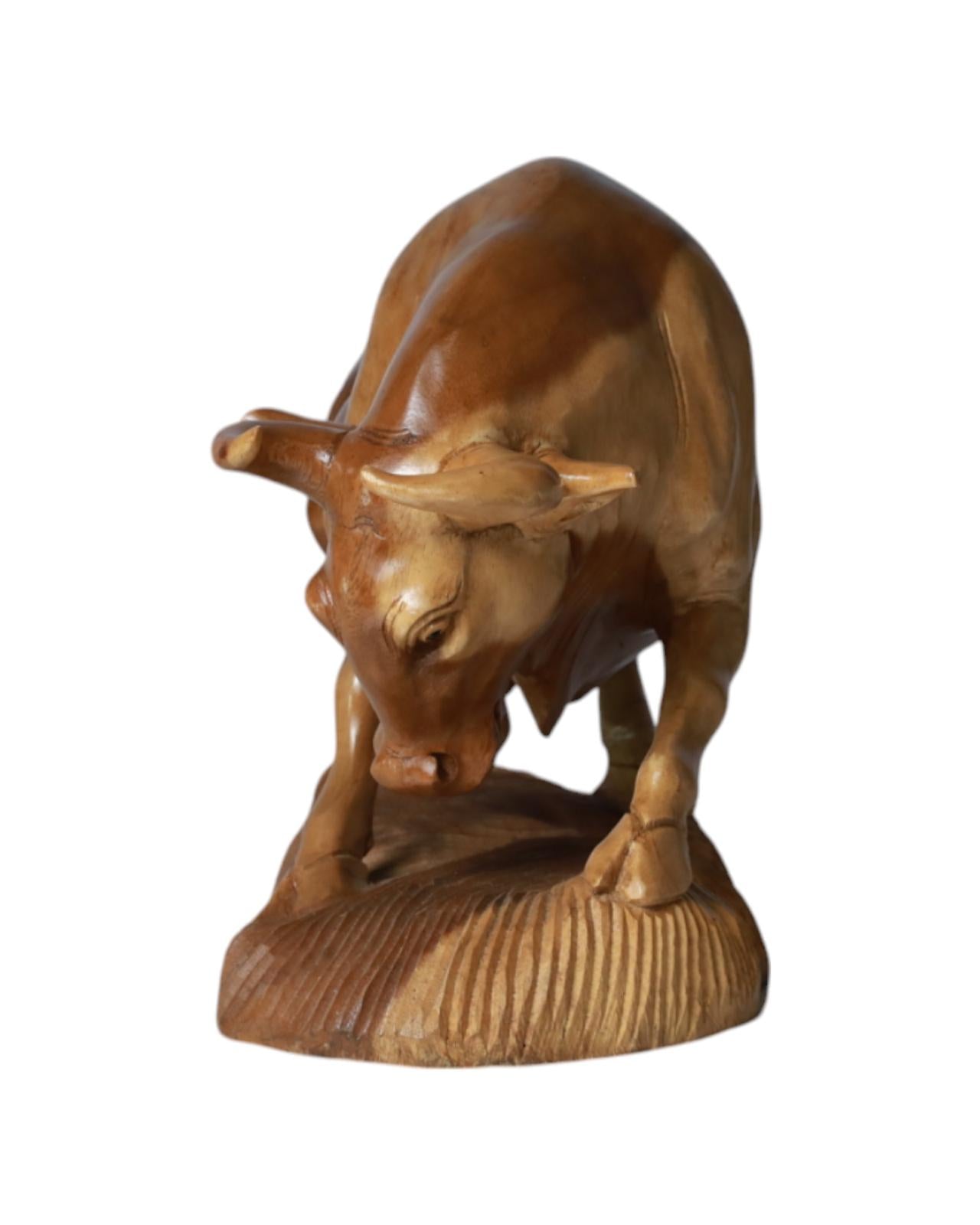 Title: Hand-Carved Wooden Bull Sculpture in Battle Stance, Crafted from a Single Piece of Durable Hardwood | Code 228